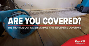 Residential room with hardwood floor pulled up and being treated for water damage with air mover fans with the text "Are You Covered?" and Peerless Cleaning & Restoration Services branding.