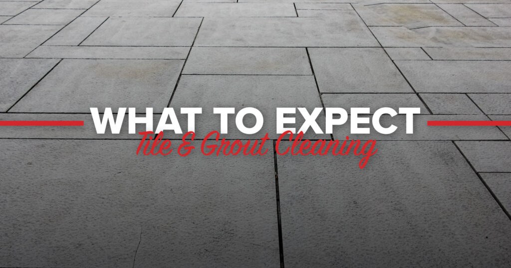 Professional tile and grout cleaning example showing large stone tile floor surface before service.