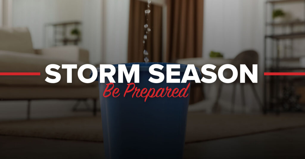 water leaking into bucket inside home during storm indicating water damage risk